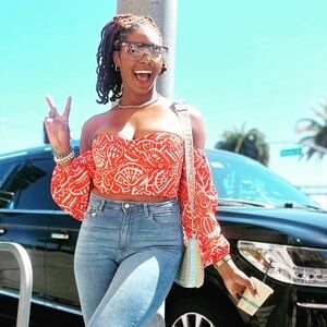 Crop top with back laced with orange ribbon